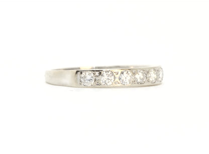 A vintage 18ct white gold diamond half eternity ring from 1975