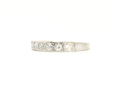 A vintage 18ct white gold diamond half eternity ring from 1975