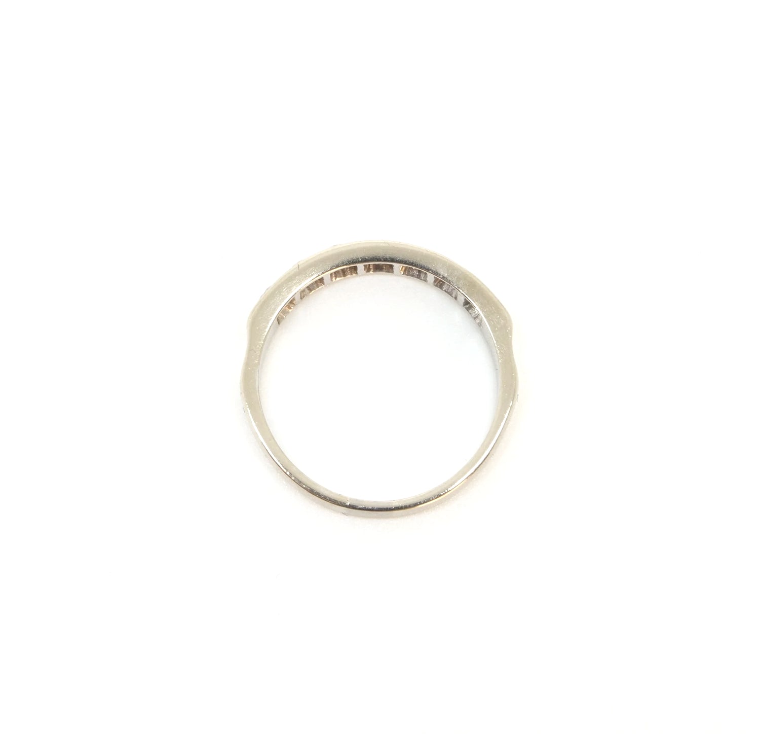 A vintage 18ct white gold diamond half eternity ring from 1975