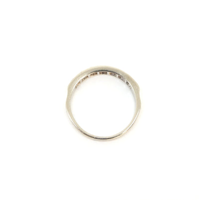 A vintage 18ct white gold diamond half eternity ring from 1975