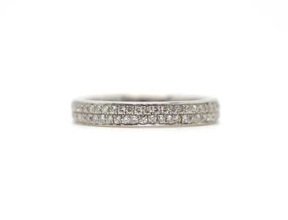 A platinum full eternity ring set with two continuous rows of round brilliant cut diamonds