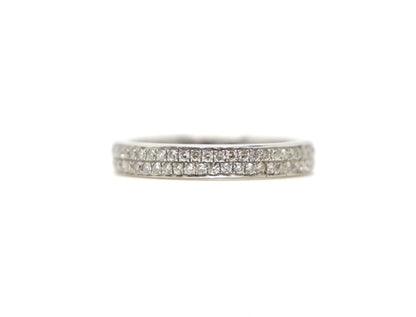 A platinum full eternity ring set with two continuous rows of round brilliant cut diamonds