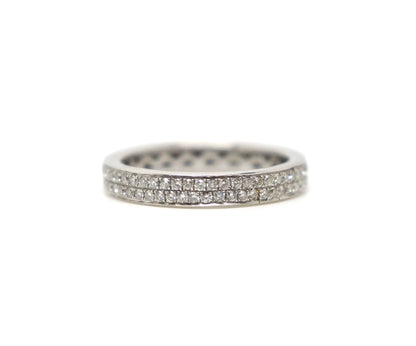 A platinum full eternity ring set with two continuous rows of round brilliant cut diamonds